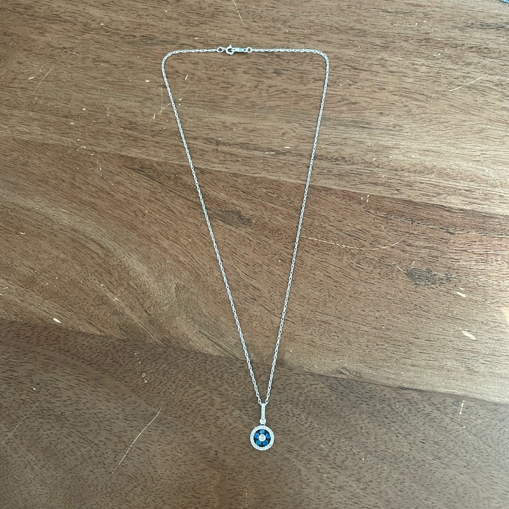 14k white gold necklace with diamond & sapphire flower pendant